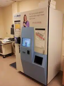 Prescription pickup kiosk standing in a clinic