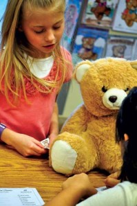 Little Girl with Teddy Bear