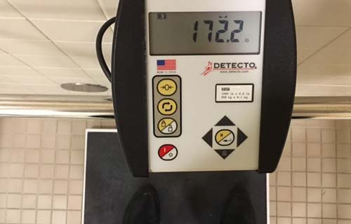 a scale displaying an individual's weight