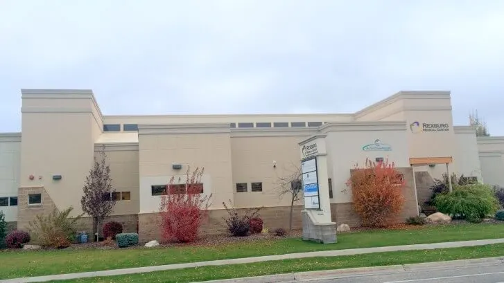 Single-story Madisonhealth clinic building with its sign out front