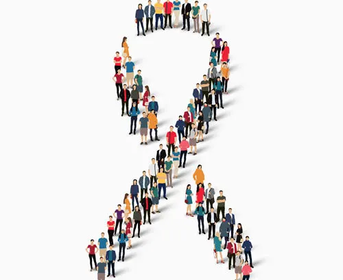 Crowd of people arranged in the shape of an awareness ribbon