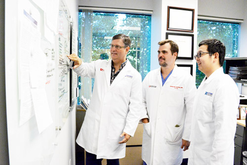 Doctors at white board