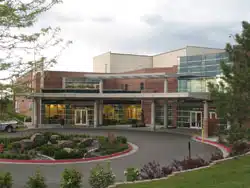 Madisonhealth hospital entrance and circular drive in summer