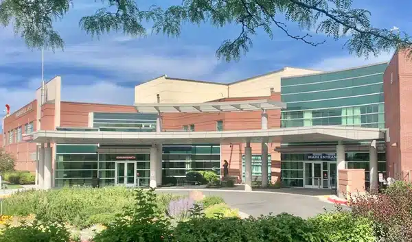 Madisonhealth hospital entrance and landscaping in summer