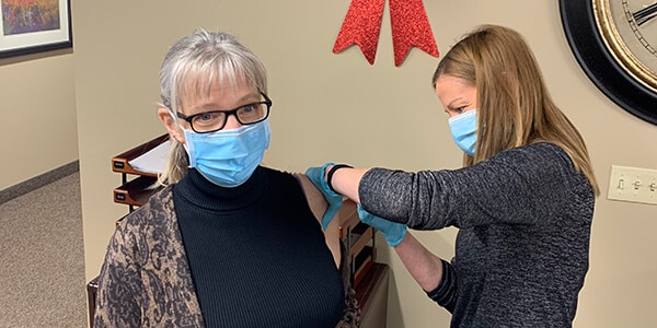 Rachel, CEO receives COVID vaccine
