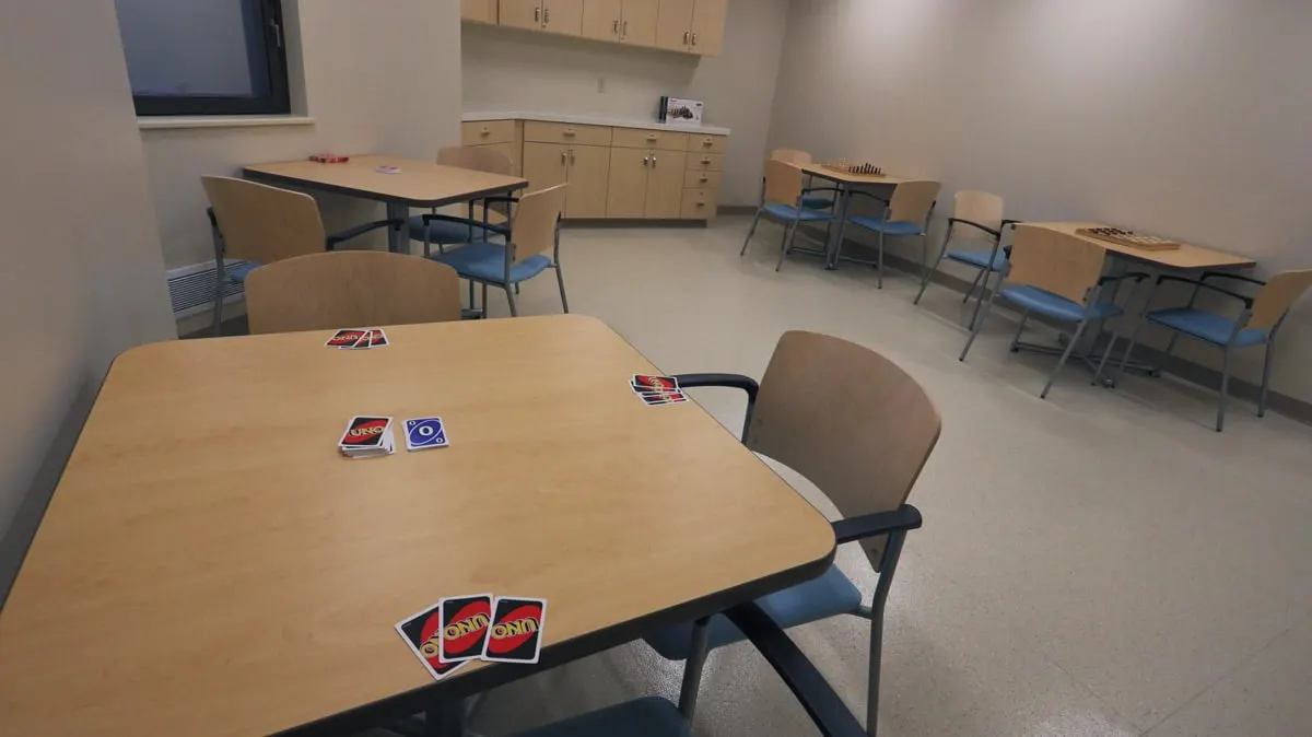 Activity room with card games laid out on the tables