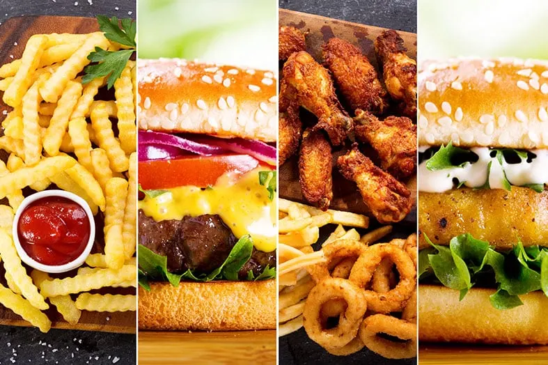 Collage of fast food: fries, burgers, chicken wings and onion rings