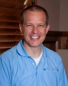Madisonhealth staff portrait: man in a light blue polo shirt