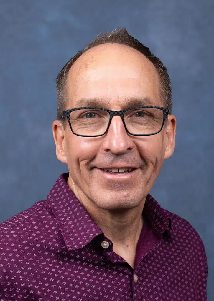 primary care physician portrait with blue background