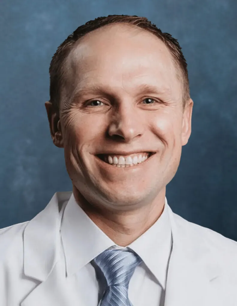 Madisonhealth physician portrait: man in a white coat and blue tie