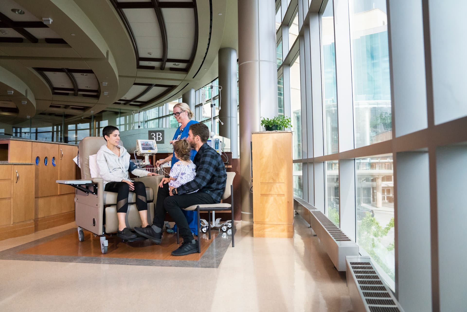 Huntsman Cancer Institute Infusion Nurse and Family (1) doctor-examining-patient