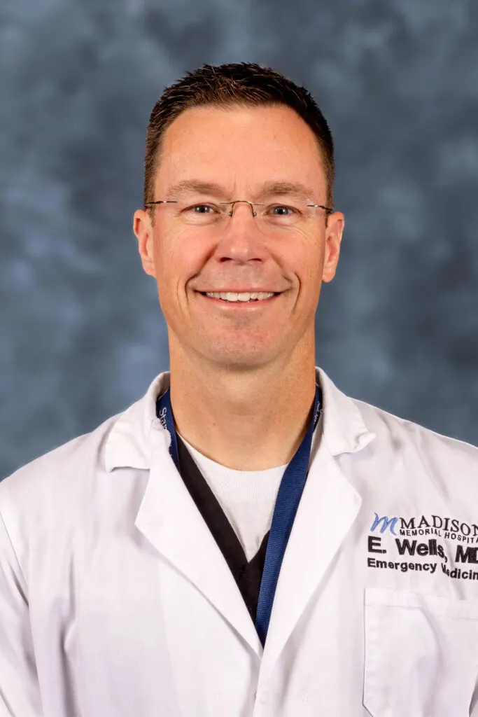E. Wells, MD, emergency medicine, in a Madison Memorial Hospital white coat