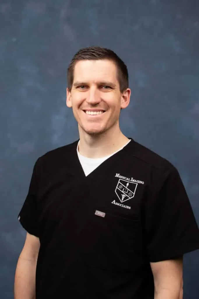 Madisonhealth staff portrait: man in black Medical Imaging Associates scrubs