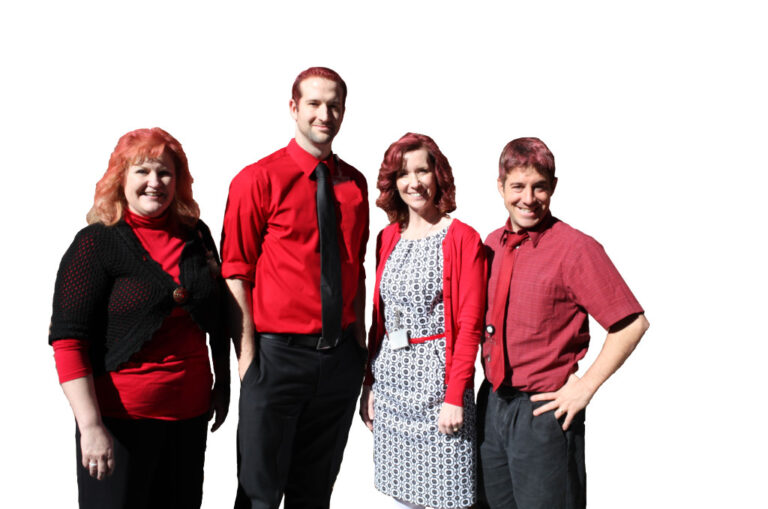 hospital employees wearing red with their hair dyed red
