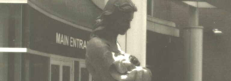statue of lady holding a baby