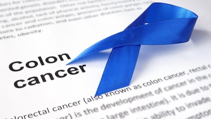 colon cancer definition with blue ribbon
