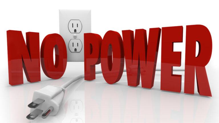 The words No Power written in red in in front of a power outlet